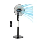 Black Amazon Basics 16-Inch Pedestal Fan standing in a modern living room corner